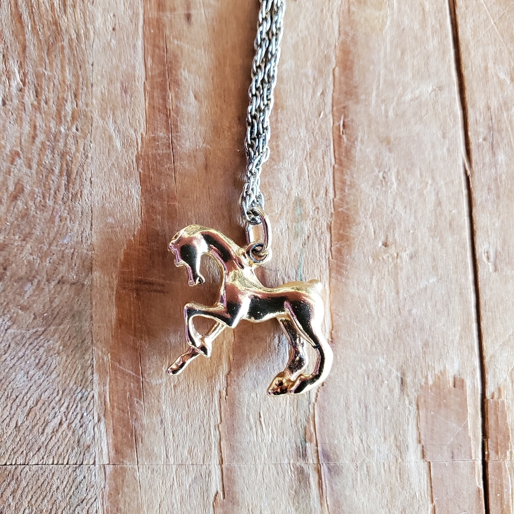 Gold horse pendant and chain necklace